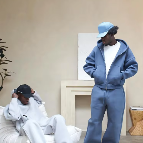 Tuta con felpa con cappuccio e cerniera e pantaloni