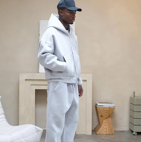 Tuta con felpa con cappuccio e cerniera e pantaloni